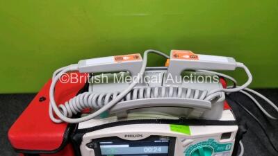 Philips Heartstart MRx Defibrillator with External Hard Paddle (Powers Up) Including Pacer, ECG, BP1, BP2, Temp, SpO2, NIBP, CO2 and Printer Options with Philips M3539A Module, Philips M3538A Battery, Philips M3725A Test Load, SpO2 Finger Sensor, Paddle - 5