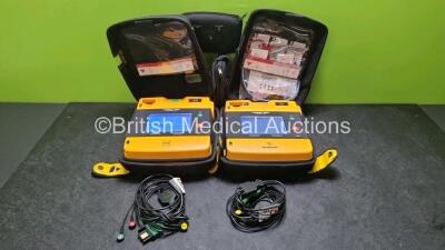 2 x Medtronic Physio Control Lifepak 1000 Defibrillators *Mfd 2021 / 2008* (Both Power Up) with 2 x 3 Lead ECG Leads and 2 x Batteries *Install Before 2026 / 2024*