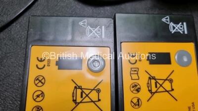 2 x Medtronic Physio Control Lifepak 1000 Defibrillators *Mfd 2012 / 2018* (Both Power Up Both with Slight Crack In Casing - See Photos) with 2 x 3 Lead ECG Leads and 2 x Batteries *Install Before 2027 / 2024* - 6