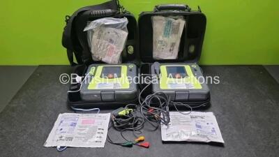 2 x Zoll AED PRO Defibrillators (Both Power Up) with 2 x 3 Lead ECG Lead and 4 x In Date Electrode Packs