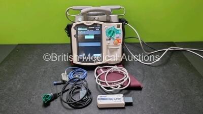 Philips Heartstart MRx Defibrillator with External Hard Paddles (Powers Up) Including Pacer, ECG, SpO2, NIBP, and Printer Options with Philips M3539A Module, Philips M3538A Battery, Philips M3725A Test Load, SpO2 Finger Sensor, Paddle Lead, and BP Cuff