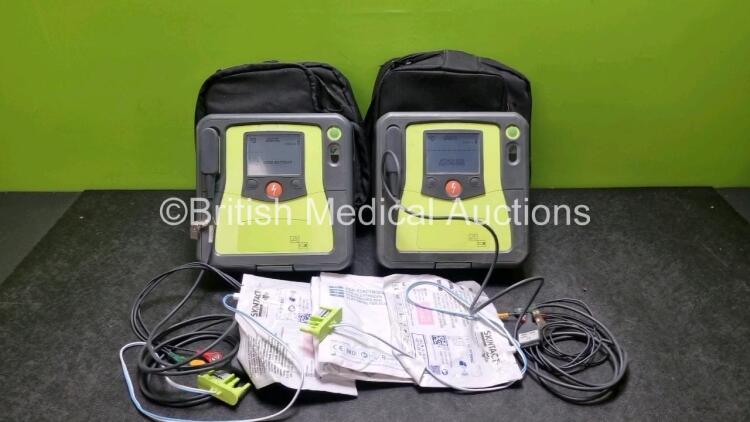 2 x Zoll AED PRO Defibrillators (Both Power Up) with 2 x 3 Lead ECG Lead and 2 x In Date Electrode Packs