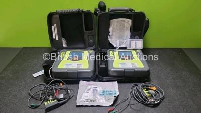 2 x Zoll AED PRO Defibrillators (Both Power Up) with 2 x 3 Lead ECG Lead and 1 x In Date Electrode Pack