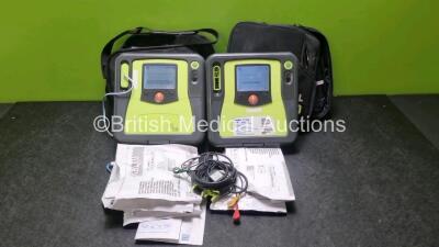 2 x Zoll AED PRO Defibrillators (Both Power Up) with 2 x 3 Lead ECG Lead and 1 x In Date Electrode Pack