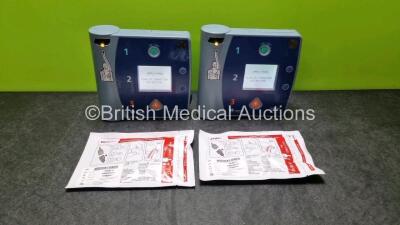 2 x Philips Heartstart FR2+ Defibrillators (Both Power Up) with 2 x Philips M3863A Batteries *Install Before - 2021 / 2019* and 2 x Electrode Packs