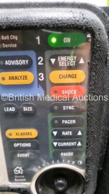 Job Lot Including Medtronic Lifepak 12 Biphasic Defibrillator P/N VLP12-02003264 (Powers Up, Damage to Casing / Paddle Lead Connection Broken - See Photos) Including ECG and SpO2 Options with 2 Batteries. 1 x 6 Lead ECG Lead. 1 x 4 Lead ECG Lead, 1 x Padd - 3