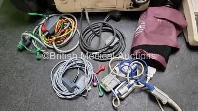 Job Lot Including Medtronic Lifepak 12 Biphasic Defibrillator P/N VLP12-02003264 (Powers Up, Damage to Casing / Paddle Lead Connection Broken - See Photos) Including ECG and SpO2 Options with 2 Batteries. 1 x 6 Lead ECG Lead. 1 x 4 Lead ECG Lead, 1 x Padd - 4