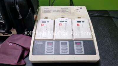 Job Lot Including Medtronic Lifepak 12 Biphasic Defibrillator P/N VLP12-02003264 (Powers Up, Damage to Casing / Paddle Lead Connection Broken - See Photos) Including ECG and SpO2 Options with 2 Batteries. 1 x 6 Lead ECG Lead. 1 x 4 Lead ECG Lead, 1 x Padd - 5