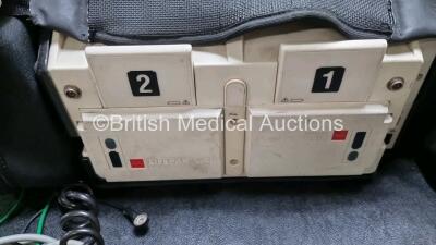 Job Lot Including Medtronic Lifepak 12 Biphasic Defibrillator P/N VLP12-02003264 (Powers Up, Damage to Casing / Paddle Lead Connection Broken - See Photos) Including ECG and SpO2 Options with 2 Batteries. 1 x 6 Lead ECG Lead. 1 x 4 Lead ECG Lead, 1 x Padd - 6