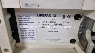 Job Lot Including Medtronic Lifepak 12 Biphasic Defibrillator P/N VLP12-02003264 (Powers Up, Damage to Casing / Paddle Lead Connection Broken - See Photos) Including ECG and SpO2 Options with 2 Batteries. 1 x 6 Lead ECG Lead. 1 x 4 Lead ECG Lead, 1 x Padd - 7