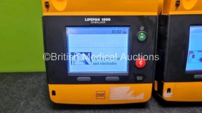 2 x Medtronic Physio Control Lifepak 1000 Defibrillators *Mfd 2015* (Both Power Up) *SN 43552211 / 43417164* - 2