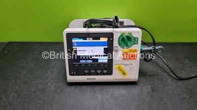 Philips Heartstart XL+ Defibrillator (Powers Up) Including ECG and Printer Options with 1 x Paddle Lead and 1 x Battery *SN US31410948*