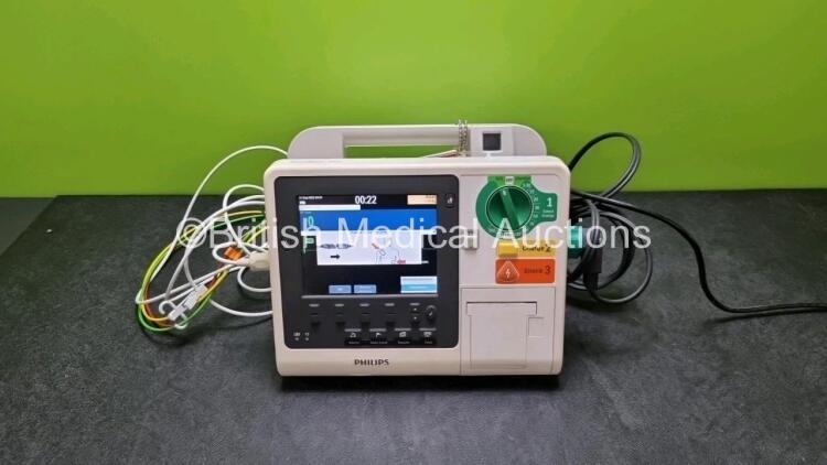 Philips Heartstart XL+ Defibrillator (Powers Up) Including ECG and Printer Options with 1 x Paddle Lead, 1 x 3 Lead ECG Lead and 1 x Battery *SN US31304564*