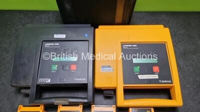 2 x Medtronic Physio Control Lifepak 500 Automated External Defibrillators (Both Power Up) with 6 x Batteries (4 x Untested) in 1 x Carry Case - 4