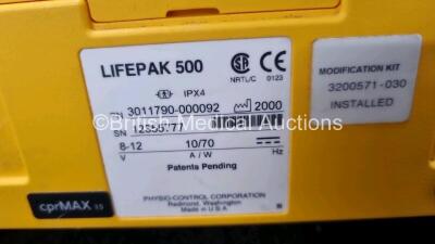 2 x Medtronic Physio Control Lifepak 500 Automated External Defibrillators (Both Power Up) with 6 x Batteries (4 x Untested) in 1 x Carry Case - 6