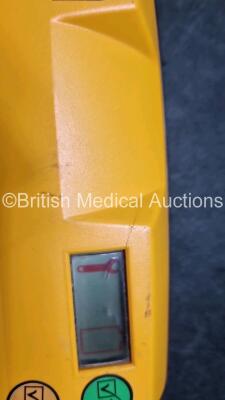 2 x Medtronic Physio Control Lifepak 1000 Defibrillators *Mfd 2009* (1 x No Power, 1 x Powers Up with Stock Battery Stock Battery Not Included, Both with Damage to Casing and Screen- See Photos) - 8