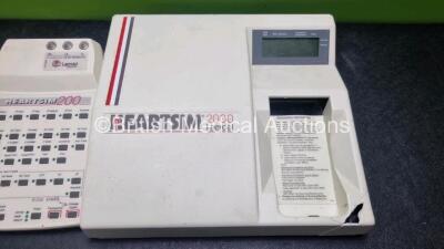 Job Lot Including 1 x Laerdal 2000 Heartsim ECG Rhythm Simulator (Damage to Casing - See Photo) and 1 x Laerdal Heartsim 200 Cardiac Rhythm Simulator - 2