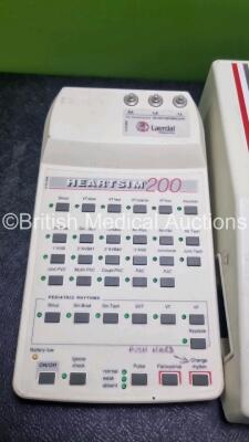 Job Lot Including 1 x Laerdal 2000 Heartsim ECG Rhythm Simulator (Damage to Casing - See Photo) and 1 x Laerdal Heartsim 200 Cardiac Rhythm Simulator - 4