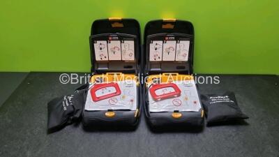 2 x Physio Control Lifepak CR Plus Defibrillators *Mfd 2016 / 2016* with 2 x Electrode Pads *Both in Date* and 2 x Res-Cue Masks in 2 x Carry Cases