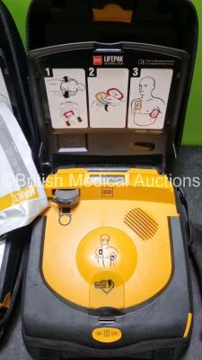 2 x Physio Control Lifepak CR Plus Defibrillators *Mfd 2016 / 2016* with 2 x Electrode Pads *Both in Date* and 2 x Res-Cue Masks in 2 x Carry Cases - 3