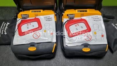 2 x Physio Control Lifepak CR Plus Defibrillators *Mfd 2016 / 2016* with 2 x Electrode Pads *Both in Date* and 2 x Res-Cue Masks in 2 x Carry Cases - 2