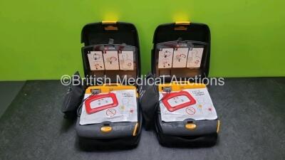 2 x Physio Control Lifepak CR Plus Defibrillators *Mfd 2016 / 2016* with 2 x Electrode Pads *Both in Date* and 2 x Res-Cue Masks in 2 x Carry Cases