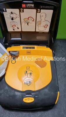 2 x Physio Control Lifepak CR Plus Defibrillators *Mfd 2016 / 2016* with 2 x Electrode Pads *Both in Date* and 2 x Res-Cue Masks in 2 x Carry Cases - 3