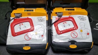 2 x Physio Control Lifepak CR Plus Defibrillators *Mfd 2015 / 2015* with 1 x Electrode Pads *Both in Date* and 2 x Res-Cue Masks in 2 x Carry Cases - 2