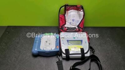 Job Lot Including 1 x Philips Heartstart HS1 Defibrillator (Powers Up) In Carry Case with 1 x M5070A Battery *Install Before 2027* and 1 x Schiller Fred Easy Defibrillator (Powers Up)