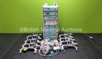 8 x B.Braun Infusomat Space Syringe Pumps (All Power Up) with 2 x B.Braun Space Station, 8 x Pole Clamps and 8 x Power Supplies (7 x Untested Power Supplies) *SN 437989 / 437877 / 438027 / 437975 / 437861 / 437870 / 437013 / 16298 / 089490*