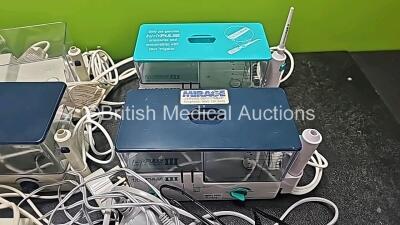 Job Lot Including 6 x ProPulse II Ear Irrigation Units with 5 x Containers, 3 x Lids and 5 x Missing Handpiece Attachments - See Photos), 2 x ProPulse III Care Ear Irrigators with 2 x Containers and Lids (Missing Handpiece Attachment and Damaged Handpiece - 4