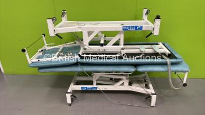 2 x Medi-Plinth Electric Patient Couches with Controllers (Both Power Up) *S/N 04878 / 04961*