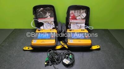 2 x Medtronic Physio Control Lifepak 1000 Defibrillators *Mfd 2008 / 2011* (Both Power Up, Both with Damage to Casing and Slight Scratching to Screen) with 2 x 3 Lead ECG Leads, 2 x In Date Electrode Packs and 2 x Batteries *Install Before 2024 / 2022*