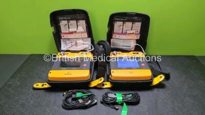 2 x Medtronic Physio Control Lifepak 1000 Defibrillators *Mfd 2008 / 2015* (Both Power Up) with 2 x 3 Lead ECG Leads, 3 x In Date Electrode Packs and 2 x Batteries *Install Before 2024*