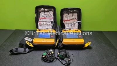 2 x Medtronic Physio Control Lifepak 1000 Defibrillators *Mfd 2008 / 2010* (Both Power Up 1 x With Scratch On Screen - See Photo) with 2 x 3 Lead ECG Leads, 2 x In Date Electrode Packs and 2 x Batteries *Install Before 2024 / 2022*