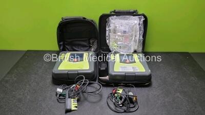 2 x Zoll AED PRO Defibrillators (Both Power Up) with 2 x 3 Lead ECG Lead, 2 x Batteries and 4 x In Date Electrode Packs