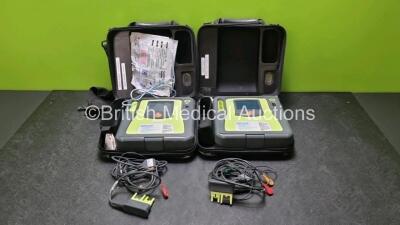 2 x Zoll AED PRO Defibrillators (Both Power Up) with 2 x 3 Lead ECG Lead, 2 x Batteries and 4 x In Date Electrode Packs