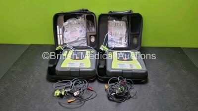 2 x Zoll AED PRO Defibrillators (Both Power Up, Both with Slight Scratching to Screen - See Photos) with 2 x 3 Lead ECG Lead and 2 x Batteries