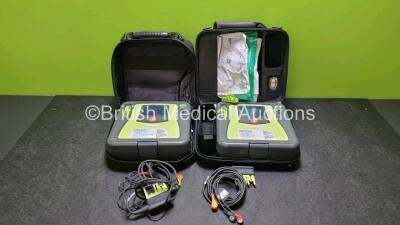 2 x Zoll AED PRO Defibrillators (Both Power Up) with 2 x 3 Lead ECG Lead, 2 x Batteries and 4 x In Date Electrode Packs