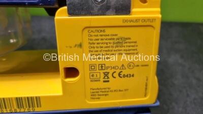 2 x LSU Laerdal Suction Units (All Power Up, 2 x with Damage to Casing - See Photo) with Hoses - 5