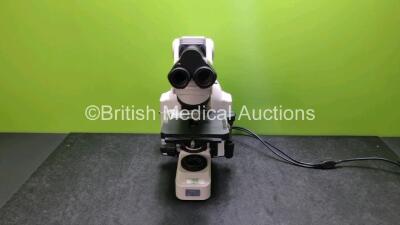 Nikon Eclipse E400 Benchtop Microscope with 2 x 10 x / 22 Eye Pieces (Powers Up) and 2 x Optics Including 1 x Plan 10 x / 0.25 and 1 x Plan 1 x 40 x / 0.65 *AN A20435*