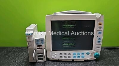 GE Datex-Ohmeda F-FM-00 Patient Monitor (Powers Up, Cracked Casing and Faulty Screen - See Photos) with 1 x GE E-PSMPW Module Including ECG, SpO2, NIBP, P1, P2, T1 and T2 Options and 1 x GE Type N-FC-00 Module with Mini D-fend Water Trap