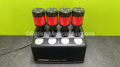 Synthes Universal Battery Charger II with 4 x Synthes 05.001.202 Batteries (Powers Up with Damage to Casing - See Photos) *SN 014007*