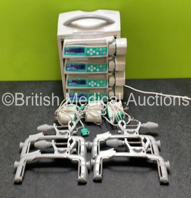 4 x B.Braun Perfusor Space Syringe Pumps (All Power Up) with 1 x B.Braun Space Station, 4 x Pole Clamps and 4 x Power Supplies (3 x Untested Power Supplies) *SN 376359 / 386866 / 386853 / 386940*