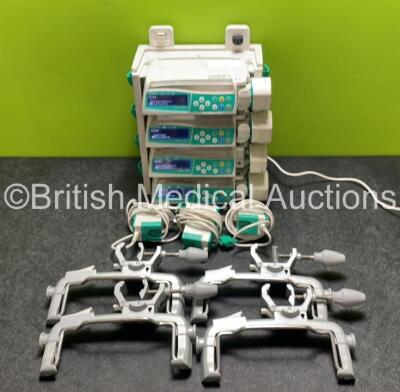 4 x B.Braun Perfusor Space Syringe Pumps (All Power Up, 1 x Damage to Casing, 1 x Alarm and Damage to Casing / Hinge - See Photos) with 1 x B.Braun Space Station (Missing Top/Handle - See Photos) 4 x Pole Clamps and 4 x Power Supplies (3 x Untested Power 