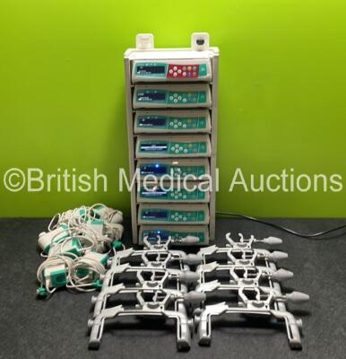 8 x B.Braun Infusomat Space Infusion Pumps (All Power Up) with 2 x B.Braun Space Stations (Missing Top / Handle) 8 x Pole Clamps and 8 x Power Supplies (7 x Untested Power Supplies) *SN 457941 / 457657 / 458007 / 449500 / 458057 / 458019 / 457559 / 457533