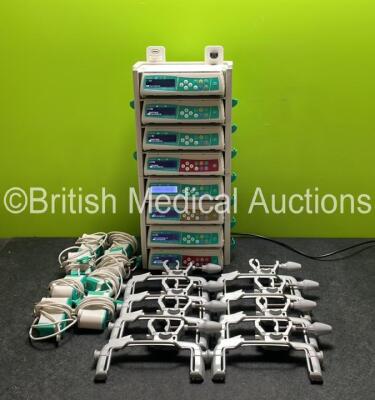 8 x B.Braun Infusomat Space Infusion Pumps (All Power Up, 1 x Blank Screen - See Photos) with 2 x B.Braun Space Stations (Missing Top / Handle) 8 x Pole Clamps and 8 x Power Supplies (7 x Untested Power Supplies) *SN 457313 / 458004 / 457520 / 457971 / 44