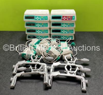 8 x B.Braun Infusomat Space Infusion Pumps (All Power Up) with 4 x Pole Clamps and 8 x Power Supplies (7 x Untested Power Supplies) *SN 458045 / 457633 / 457952 / 457546 / 457906 / 457569 / 457310 / 457957*