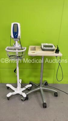 1 x Welch Allyn SPOT Vital Signs Monitor on Stand with BP Hose (No Power) and 1 x Bladder Scan BVI 3000 Bladder Scanner on Stand with Transducer (Powers Up) *S/N 03044305*