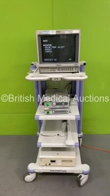 Olympus Stack Trolley with Sony Monitor (Powers Up) Olympus CLH-SC Light Source (Powers Up) Olympus OTV-SC Digital Signal Processor (No Power Port) and Olympus EndoALPHA UCES-2 Unit (Powers Up)